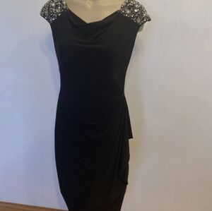 Elegant Black Dress with Embellished Shoulders